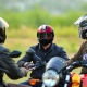 A motorcyclist controls the s9x helmet intercom with voice
